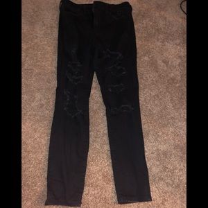 NWOT black ripped jeans. Size 10 short